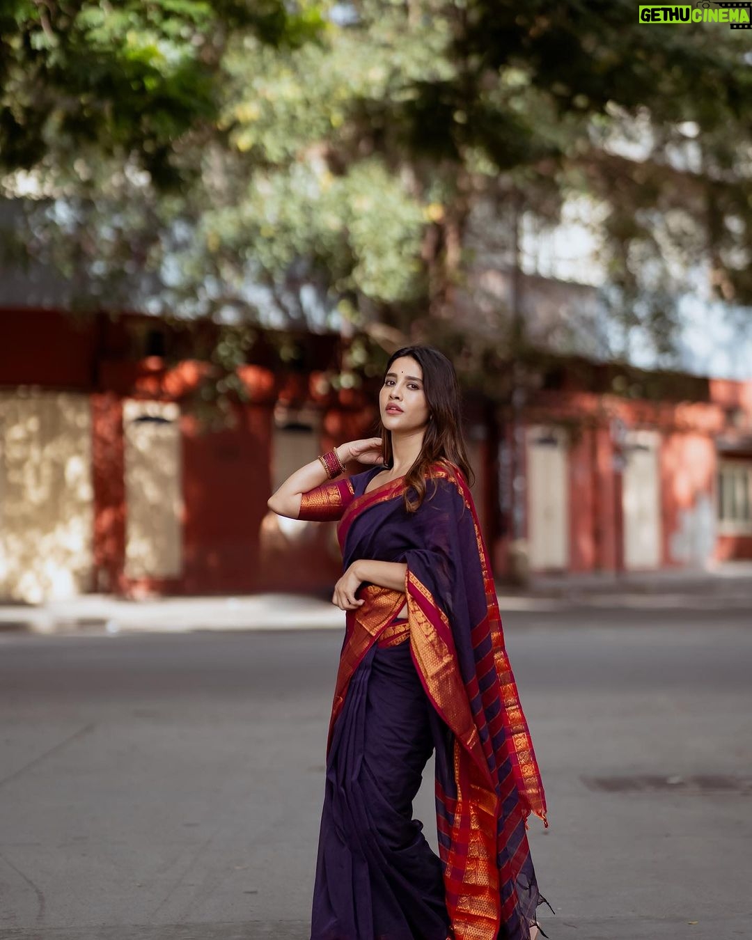 Nabha Natesh Instagram - Woke up one day and decided to take a stroll on the streets of old Bengaluru. Some of these buildings and walls are centuries-old. I’ve always wondered what these stones have witnessed all through these years. The stories must be fascinating ! : : : Photographer: @ponnappa Stylist - @sandhya__sabbavarapu Assisted by - @sirichandana_medi Hair: @harshasingh512 Mua : @makeoverby_jyothi.pradeep