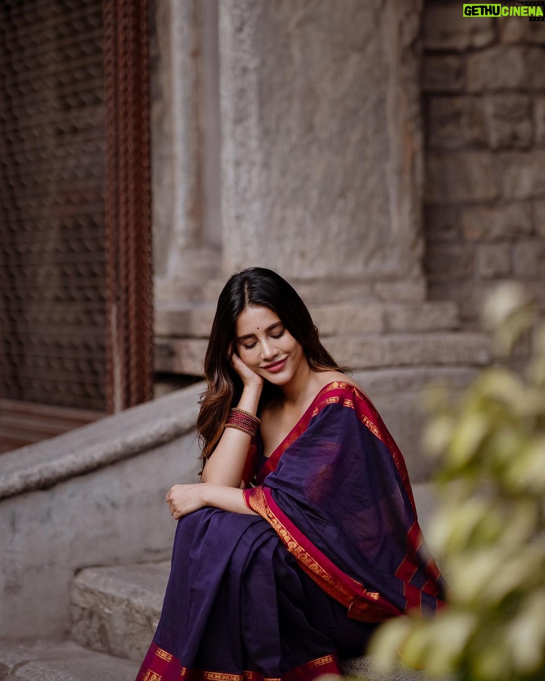 Nabha Natesh Instagram - Woke up one day and decided to take a stroll on the streets of old Bengaluru. Some of these buildings and walls are centuries-old. I’ve always wondered what these stones have witnessed all through these years. The stories must be fascinating ! : : : Photographer: @ponnappa Stylist - @sandhya__sabbavarapu Assisted by - @sirichandana_medi Hair: @harshasingh512 Mua : @makeoverby_jyothi.pradeep