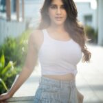 Nabha Natesh Instagram - when one’s fav pass time be sun-soaking . So can u guess if these pictures where taken in the morning or evening? : : Photography : @jagguvarmaa