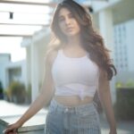 Nabha Natesh Instagram - when one’s fav pass time be sun-soaking . So can u guess if these pictures where taken in the morning or evening? : : Photography : @jagguvarmaa