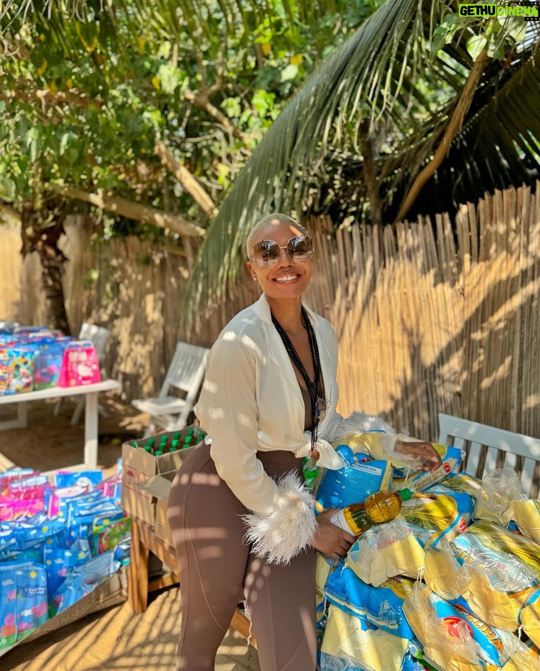 Nancy Isime Instagram - On my way to my New Year Holiday destination, as we drove through the beach front community to the resort in Ouidah, I saw a bunch of Happy Kids just running around, playing, waving and just being Kids. That picture lingered in my heart for a minute, I wanted to be a part of the Children’s Joy, to be a reason they have even bigger smiles and a wonderful New Year! So I asked my Lodge’s owner and manager if it was okay to have a mini party for the Kids and mothers of the community. I asked for a figure(number of kids &Mothers), booked the venue(the resort’s beachfront), arranged for some bags of rice, oil and a chef to cook some local delicacy for the kids, sent for gift items from Lagos and arranged to have it transported to me and Voila! Lunch with Nancy was brought to Reality! As hectic as it looks, I had such a great time! My heart bursting with Joy!😄🥰 Of all the Gifts of the Spirit, Love, Joy, Peace, Kindness and Goodness remain my Favorites and I do everything in my power to practice these everyday and everywhere I go. I’m thankful to God for causing my plans and Idea for this day to come to fruition even under such short notice and barely any planning. I’m thankful to the resort’s owner, Manager & Staff for doing everything in their power to see to its success. I’m very thankful to the mothers & kids of the Laguna, Ouidah community for letting me partake in their Joy and start their New Year with some goodies..Even with the language barrier and me being a complete stranger, my invitation was still honored and respected. Shoutout to my girl Adaora for agreeing under such short notice to bring the gift items over as well as help me out during our mini lunch party. Shoutout to my amazing team for co-ordinating/helping with the market runs for the gift items. God is the Kindest❤️ I hope this inspires you to look around and make a difference even while on Holiday☺️ Ouidah, Bénin