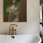 Nate Berkus Instagram - Some previously unseen moments from the primary bathroom of our NYC home. I found this mid-century figural abstract by painter Thom Leyland on @liveauctioneers, one of my favorite places to hunt down unique finds.