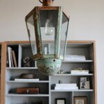 Nate Berkus Instagram - NYC office details: shelves filled with family mementos and memories of travel.