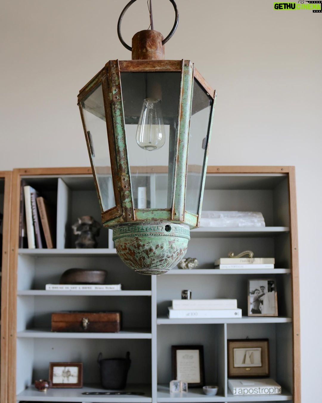 Nate Berkus Instagram - NYC office details: shelves filled with family mementos and memories of travel.