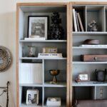 Nate Berkus Instagram - NYC office details: shelves filled with family mementos and memories of travel.