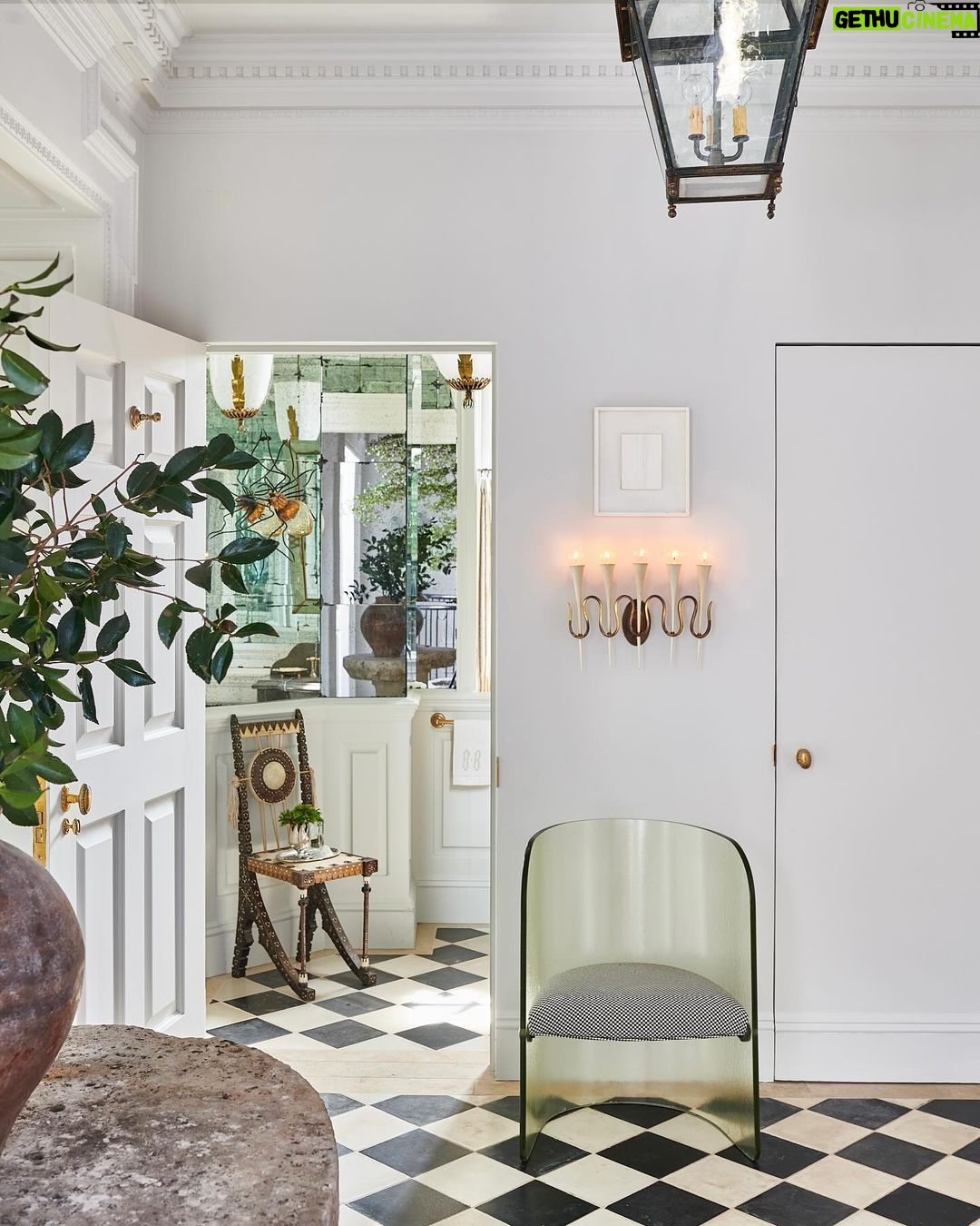 Nate Berkus Instagram - In our NYC home, @Jeremiahbrent found a style that combines our individual styles - the entryway is covered with a reclaimed black and white Spanish tile that we both love and have featured in many of our homes together.