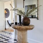 Nate Berkus Instagram - In our NYC home, @Jeremiahbrent found a style that combines our individual styles - the entryway is covered with a reclaimed black and white Spanish tile that we both love and have featured in many of our homes together.