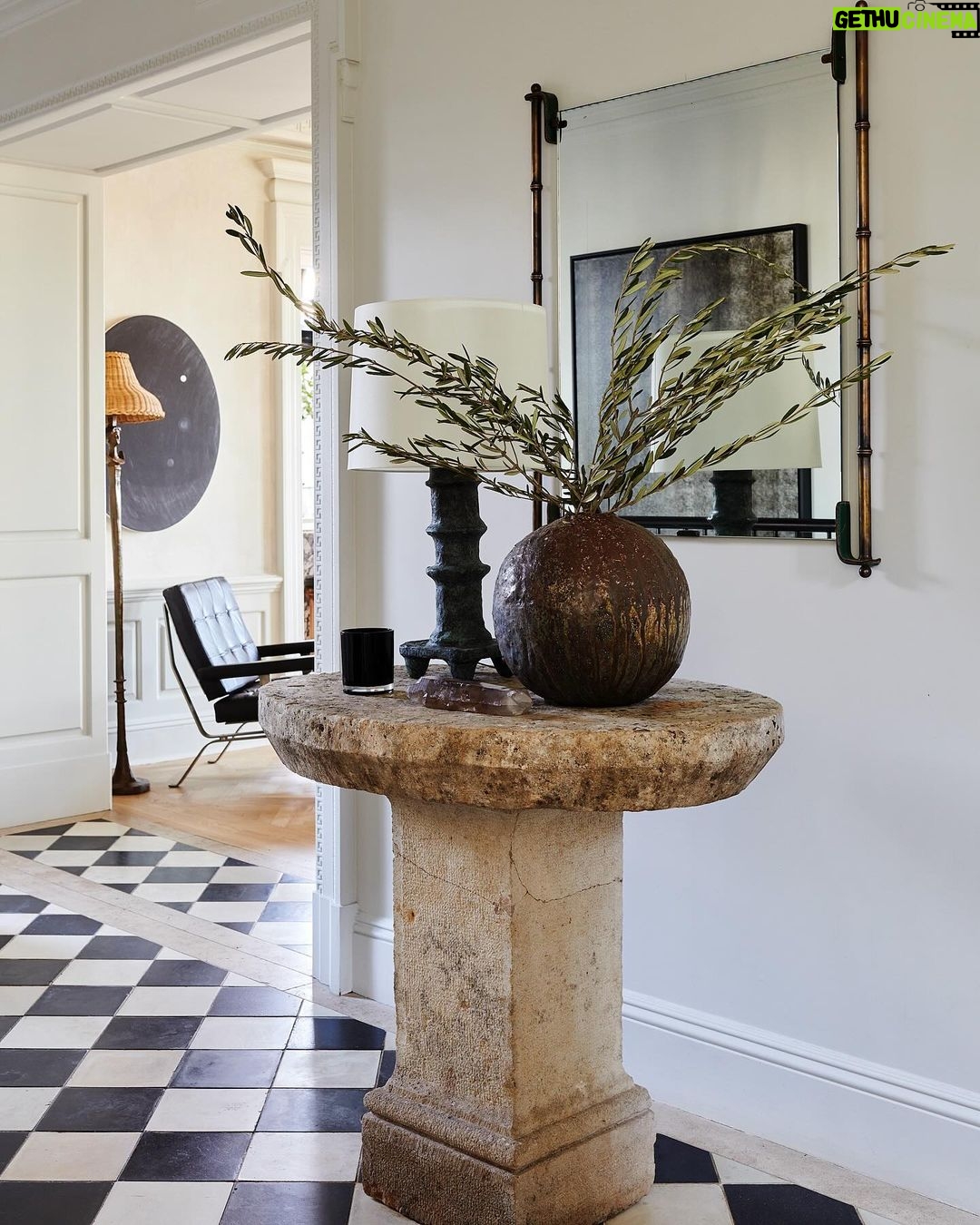 Nate Berkus Instagram - In our NYC home, @Jeremiahbrent found a style that combines our individual styles - the entryway is covered with a reclaimed black and white Spanish tile that we both love and have featured in many of our homes together.