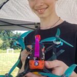 Nathalie Boltt Instagram - My speed-demon drone pilot @sickpixel_ knows how to push it to the limit like the best of ‘em! Repost from @sickpixel_ • Hey @peacemaker_filmworks, remember when you said,"the best shot is always too close". Well..... Yup! A brace arm and a lens are a small price to pay. Thanks @kwadsrus , @race_miata, @flywithmefpv, @bonfpv, @zenith.fpv, @klawlz13 for an epic @multigp race day. #fpv #multigp #fpvracing #fpvdrone #peacemakerfilmworks