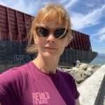 Nathalie Boltt Instagram - Chasing the sun on sunset beach. Found that hideous barge, that lump of metal, washed up to block the view and blue of sky. Rewild the earth, man. Keep man-made things at bay. @rewritingextinction #bargeonthebeach