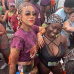 Nathalie Emmanuel Instagram - So I was supposed to leave London on Friday to the US and miss the first @nhcarnivalldn in 3 YEARS! My heart was broken!!! But… the universe provided and I got to be with @curvynyome and her crewdem and follow @chocolatenationmas last minute for Day 1! When I’m on phone calls people sound really far away because the chocolate got in my phone… but it was worth it 😁🤣🤣 But truly, my heart is full and my soul is healed from getting to wave my flags, dance to soca and be with beautiful people celebrating our beautiful culture. Welcome back Notting Hill Carnival…. This little piece of the world is right again. 🇱🇨🇩🇲💚💚💚💚💚💚💚💚💚💚💚 #NottingHillCarnival2022 #Day1 #JusticeforGrenfell #chocolatenationmas #GETREADYTOJOMP Notting Hill Carnival Init!