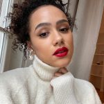 Nathalie Emmanuel Instagram - Virtual press for #LastTraintoChristmas (Out on Sky Cinema December 18th) requires snowy jumpers, red lips and bauble like pearl earrings… and hair and make up by @norarobertson_mua. 🚇🎁🎄 Jumper: @nanushka 💚🌱 Earrings: @miumiu ⚪️⚪️