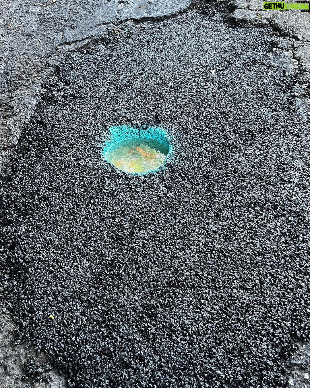 Nathan Fillion Instagram - I decided to fix a pothole on my street. Learned a lot for how to do it next time. Clean, fill (minus one spot), paint, fill with epoxy resin, add goldfish.