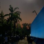 Nathan Fillion Instagram – I call this photo, “TDK by Moonlight on the Beach”. Only it’s not a beach, it’s a set. And it’s not the moon, it’s a giant light on the top of a crane. And I have no idea whether I’m wearing pants in this photo. #suicidesquad #jamesgunn #moviemoon #somethinginmyeye