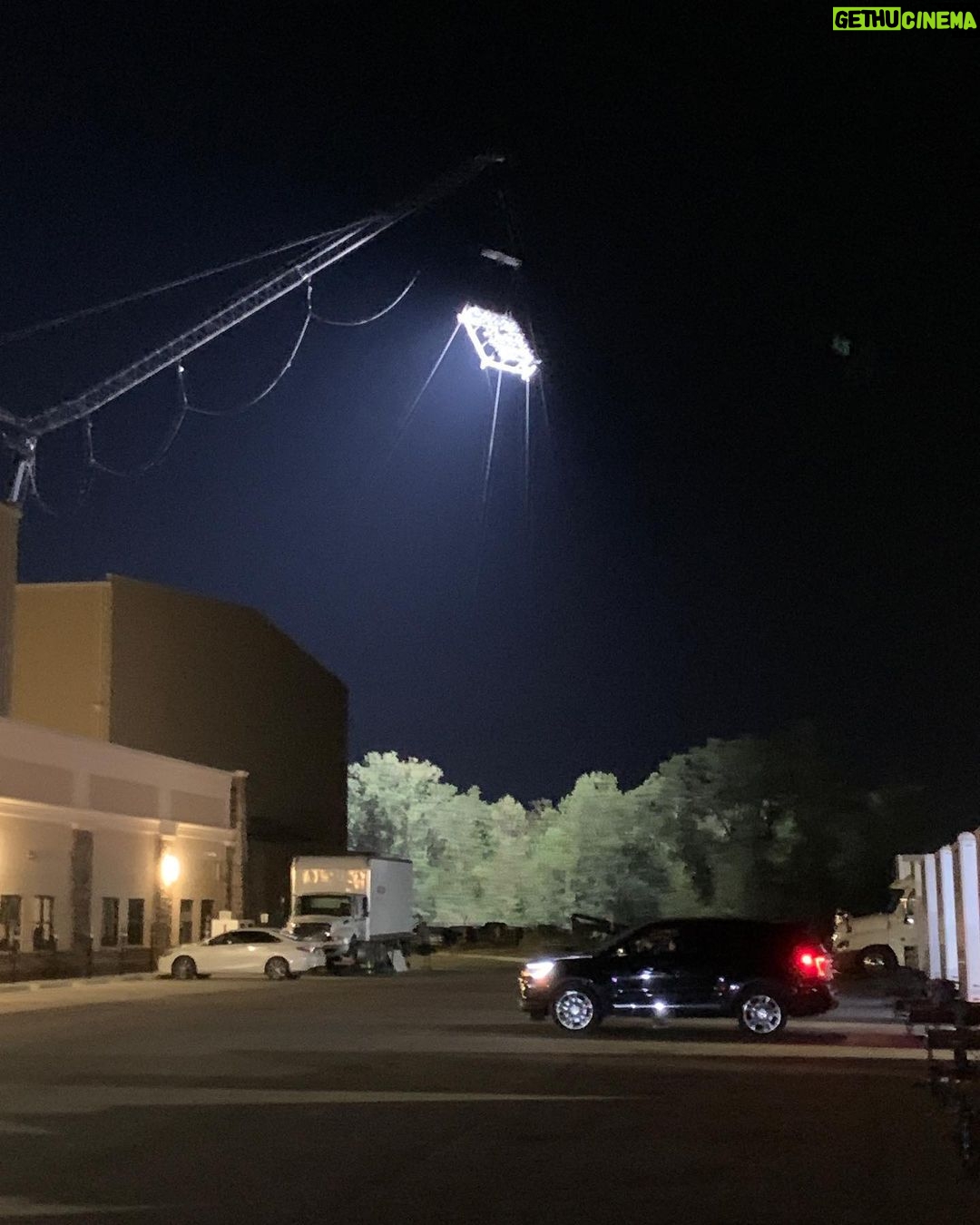 Nathan Fillion Instagram - I call this photo, “TDK by Moonlight on the Beach”. Only it’s not a beach, it’s a set. And it’s not the moon, it’s a giant light on the top of a crane. And I have no idea whether I’m wearing pants in this photo. #suicidesquad #jamesgunn #moviemoon #somethinginmyeye
