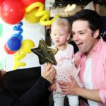 Nathan Kress Instagram - First event with Evie was a smashing success! Huge thanks to the @nickelodeon and @pawpatrol family for inviting us to celebrate their 10-year "All Paws on Deck" screening. Evie is obsessed with dogs, so Paw Patrol has always been her jam. And I got to bring her to my old stomping grounds, which was super fun too 🥰