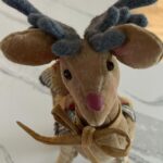 Nattie Katherine Neidhart-Wilson Instagram - One of my favorite holiday gifts I’ve been given is a hand-sewn reindeer, we named Rudy, made by my mom. She created him entirely with her imagination. She drew up a pattern and sewed him by hand. I love how she put makeup on his face. The antlers are made out of an old cashmere sweater that my grandfather Stu used to wear around the Hart House. My mom repurposed the sweater and put it into her art. It just makes it that much more meaningful. ❤️🎄 @ellie_neidhart