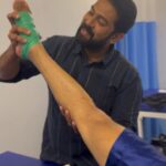 Neeraj Madhav Instagram - Last day I twisted my ankle while performing a fight sequence for RDX. Everyone was worried cos we had 3 more days to go & I could barely walk. Fortunately my physio @tomyashly showed up at the sets and tapered my leg, so I could finish the fight sequence. In the following days he was constantly helping me to release the tightness and recover from the injury meanwhile also being able to do the stunts. As much as I realised the importance of physiotherapy, not only for recovering from injury but also for strengthening ; I also have to acknowledge and appreciate Ashly’s efforts to show up at locations at odd hours, often midnights and assist me to finish the entire action sequence. This isn’t a paid post, but a genuine thank you post. Let’s get stronger together @tomyashly 🙌🏽