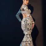 Neha Shetty Instagram - A black and white statement in a colourful world. 🖤🤍 . . . Styled by @rashmitathapa Shot by @angadbhatia Wearing @riantasofficial via @vblitzcommunications Jewellery @kalon_artjewellery Hand accessories @houseofqc Makeup @kiranmakeup Hair @crafted_hair_by_her #rulesranjann