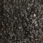 Neil deGrasse Tyson Instagram - What looks like a lava field is simply a close-up of food — I don’t remember what — left in a pan on the stove over low heat for way too long. The molecular chains that comprise what we eat, ultimately broke apart, exposing the black-carbon chemical foundations of all food, and of all life as we know it.