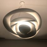 Neil deGrasse Tyson Instagram - A color photo with no color in it — just shades of sepia. My living room suspension lamp designed by Artemide, for which the light source may be more intriguing than whatever it’s trying to illuminate. For me, the interplay of light and shade evokes close-up @NASA images of Saturn’s ring system, casting shadows on Saturn itself.