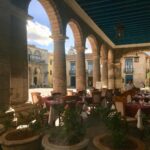 Neil deGrasse Tyson Instagram - Restaurant off the Plaza de la Catedral, Havana, Cuba. The seemingly exaggerated perspective with mixture of vibrant colors and muted stone evokes for me many Renaissance paintings of archway-lined plazas.