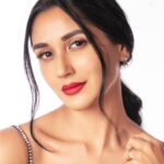 Nikita Dutta Instagram - Stressed and red lipstick obsessed 💄💋 . . . . . 📸: @deepak_das_photography Styled by @vidyulaa Assisted by @fpramod Make up: @poonamsrv Hair: @guddetisavvy Wearing @ranbirmukherjeeofficial Earrings @houseofmitti Managed by @janviiishettyyy