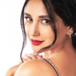 Nikita Dutta Instagram - Stressed and red lipstick obsessed 💄💋 . . . . . 📸: @deepak_das_photography Styled by @vidyulaa Assisted by @fpramod Make up: @poonamsrv Hair: @guddetisavvy Wearing @ranbirmukherjeeofficial Earrings @houseofmitti Managed by @janviiishettyyy