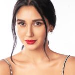 Nikita Dutta Instagram - Stressed and red lipstick obsessed 💄💋 . . . . . 📸: @deepak_das_photography Styled by @vidyulaa Assisted by @fpramod Make up: @poonamsrv Hair: @guddetisavvy Wearing @ranbirmukherjeeofficial Earrings @houseofmitti Managed by @janviiishettyyy