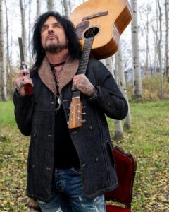Nikki Sixx Instagram - Mr Smith and Wesson and my mid 90’s Don Musser acoustic… Photo by @how2girl with @leica_camera SL2. Grand Teton National Park