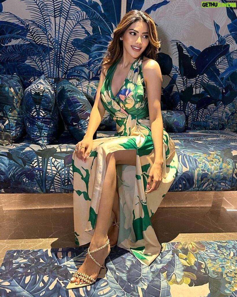 Nikki Tamboli Instagram - Are you in love with my AURA…???🌵💚🌹 . . . . . . . . . . . . Outfit: @mandirawirkhq . . . #green #vibe #floral #goa