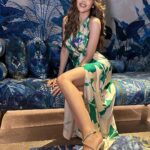 Nikki Tamboli Instagram - Are you in love with my AURA…???🌵💚🌹 . . . . . . . . . . . . Outfit: @mandirawirkhq . . . #green #vibe #floral #goa