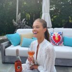 Nina Agdal Instagram - You guys know how much I love @kimcrawfordwine, so naturally I had to kick off the weekend with a glass 🍷. Have you tried their new Illuminate line? It’s SO good, and has a lower ABV content compared to classic Kim. It’s the perfect way to #KeepItLight on a Friday! 😍#kimcrawfordpartner