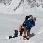 Nirmal Purja Instagram - Give Back I am proud to support my #team and staff and help them also #Achievetheirnewpossible, not only in the mountains but also in life. From guides and cameramen to porters, basecamp staff and admin personal; I am super proud of them all! These folks make the experience with @eliteexped what it is - world class. And to also be able to create regular, well paid work for them! This supports the wider community in the Big Mountains too. It is important to help and support each other in life. Copyright: Nimsdai 📸 @climber_ramesh #Teamwork #Nimsdai #EliteExped #Bigmountains #pakistan Karakoram Range