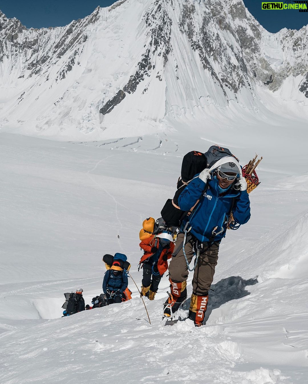 Nirmal Purja Instagram - Give Back I am proud to support my #team and staff and help them also #Achievetheirnewpossible, not only in the mountains but also in life. From guides and cameramen to porters, basecamp staff and admin personal; I am super proud of them all! These folks make the experience with @eliteexped what it is - world class. And to also be able to create regular, well paid work for them! This supports the wider community in the Big Mountains too. It is important to help and support each other in life. Copyright: Nimsdai 📸 @climber_ramesh #Teamwork #Nimsdai #EliteExped #Bigmountains #pakistan Karakoram Range
