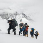 Nirmal Purja Instagram - Give Back I am proud to support my #team and staff and help them also #Achievetheirnewpossible, not only in the mountains but also in life. From guides and cameramen to porters, basecamp staff and admin personal; I am super proud of them all! These folks make the experience with @eliteexped what it is - world class. And to also be able to create regular, well paid work for them! This supports the wider community in the Big Mountains too. It is important to help and support each other in life. Copyright: Nimsdai 📸 @climber_ramesh #Teamwork #Nimsdai #EliteExped #Bigmountains #pakistan Karakoram Range