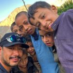 Nirmal Purja Instagram - As we walked through the little villages enroute to #Nangaparbat , I met these young kids. They were asking for chocolates and sweets. Immediately it came into my mind about my childhood. I used to do the same; asking for sweets from tourists who were trekking. Looking back to those humble beginnings and then forward to how far I have come - it was very emotional. And the journey continues.🙌🏽🙏🏽 I want to thank my family, especially my mum and brothers who sent me to a good school after they passed the Gurkha selection, and my mum for bring me up in the way she did. To those who are dreaming big - it’s possible. If I can do it - so can you. Just don’t dream though - "Act on your dreams.” More stories in my book Beyond Possible. Copyright @nimsdai #nimsdai #14peaks #14peaksnothingisimpossible #achieveyournewpossible #nothingisimpossible #nims #nimspurja #14peaks6months #beyondpossible #k2winter #k2firstascentnoo2 #uksf #club8000ers #everest #k2 #k2winter #aboveandbeyondadventure #alwaysalittlehigher #nimsdaifoundation #bigmountaincleanup #nimsdaistore #nimsdaiultimatesummitsuit Pakistan