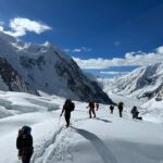Nirmal Purja Instagram - Our team have been working extremely hard at G1 & G2. Today all our members and Sherpa guides have arrived at Camp One. There’s a lot of moving components. The majority of our Sherpa guides went up straight to G2 to drop tents and oxygen as our members will be moving to Camp Three directly tomorrow, leaving at 3 am. Meanwhile our director himself @Mt.Sherpa and senior guide @guideyukta went to drop 800m of ropes and 20 snow bars so that other teams could use them to fix on G1. The big mountain community is very small and @eliteexped is doing whatever it can to support and work together as a team. Stay tuned for more updates. 👊🏽💥 Copyright @nimsdai #eliteexped #nimsdai #14peaks #14peaksnothingisimpossible #achieveyournewpossible #nothingisimpossible #nims #nimspurja #14peaks6months #beyondpossible #k2winter #k2firstascentnoo2 #uksf #club8000ers #everest #k2 #k2winter #aboveandbeyondadventure #alwaysalittlehigher #nimsdaifoundation #bigmountaincleanup #nimsdaistore #nimsdaiultimatesummitsuit Karakoram Range