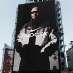 Nirmal Purja Instagram - NEXT LEVEL. It’s been quite a hell of a journey for this man who grew up in a very humble family in Nepal and be where I am now. “Success is not a coincidence“- the man himself only knows the depth of the sacrifice, hard work and dedication it took to get there. Coming from nowhere and now inspiring millions of people is quite an emotional journey for myself. Today I would like to thank specially @champagnepapi and @officialnocta for this honour and I’m equally thankful to @nike for giving me this platform. To everyone with big dreams out there, stay committed, stay self-disciplined, stay self-motivated, ignore the negativity, keep your circle tight and keep believing in yourself - you will eventually make it! 🙌🏽🙏🏽 Grateful to you brother @champagnepapi with @nike @officialnocta. Go check out the billboard at Penn Station NYC, By Maddison Square Gardens and tag me in your photos 😎 #Nimsdai #EliteExped #Skydivenimsdai #Nimsdaifoundation #k2winter #Nimsdaistore #UKSF #K2winterno02 #14peaks #Achieveyournewpossible #nothingisimpossible #14peaksnothingisimpossible #SBS #Ghurka #beyondpossible #MotivationalSpeaker #Expedleader #Nike #Nocta #Drake Penn Station-NYC