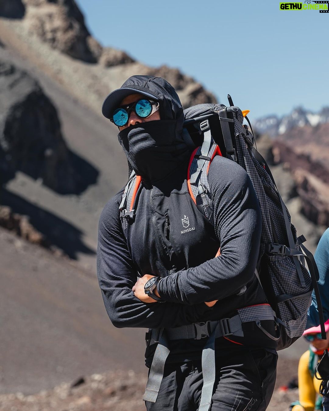 Nirmal Purja Instagram - 🌟 Introducing our new UNISEX base layer! If you haven’t got it already 👊🏽🌟 Designed to provide the ultimate first layer of warmth, I am thrilled to present to you our latest creation. 🙌🔥 After countless climbs and relentless testing , I have poured my heart and soul into perfecting this base layer. And trust me, it’s bound to be the best out there! 💪 Here’s what makes our base layer stand out: ✨ Polyester material: The soft fabric and covered seams ensure unmatched comfort during your adventures. ✨ Close-fitting design: Maximize heat retention with a snug fit that feels like a second skin. ✨ Anti-microbial technology: Say goodbye to odors! Our base layer wicks away sweat and is breathable, keeping you fresh and comfortable. ✨ Built-in UV protection: With UPF 50, our garment offers long-lasting sun protection wash after wash. ✨ Chest zip pocket: Keep your essentials close at hand with the convenient chest zip pocket. ✨ Built-in face covering and hood: Stay protected from the elements with a built-in face covering and hood for added versatility. ✨ Extra-long front zip: Need some extra ventilation? Our base layer features an extra-long front zip for easy temperature control. ✨ Thumb loops: Ensure added protection from the elements with thumb loops that keep your sleeves in place. ✨ Helmet-friendly: Wear it under your helmet for an extra layer of warmth during those chilly adventures. ✨ Extra-long back: Say goodbye to chafing! Our base layer’s extended back prevents packs from irritating your skin. Available now in my shop! Click the link in my bio to get your hands on this game-changing base layer. 🛒💥 Don’t miss out on the ultimate first layer of warmth. Get yours today and elevate your outdoor experience to new heights! 🏔️❄️ I’m super proud to be donating 5% of profit to @nimsdai_foundation 🙏🏽 #BaseLayer #OutdoorGear #UnisexDesign #StayWarm #AdventureReady #ShopNow #nimsdai #nimsdaistore #14peaks #k2winterno02 #aconcagua Plaza De Mulas, Aconcagua Base Camp 4.200 MSNM