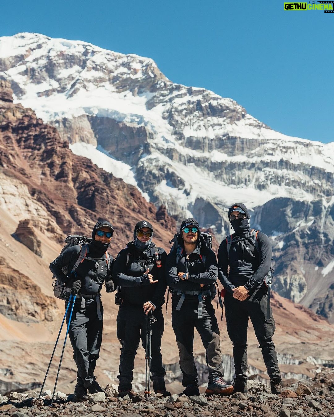 Nirmal Purja Instagram - 🌟 Introducing our new UNISEX base layer! If you haven’t got it already 👊🏽🌟 Designed to provide the ultimate first layer of warmth, I am thrilled to present to you our latest creation. 🙌🔥 After countless climbs and relentless testing , I have poured my heart and soul into perfecting this base layer. And trust me, it’s bound to be the best out there! 💪 Here’s what makes our base layer stand out: ✨ Polyester material: The soft fabric and covered seams ensure unmatched comfort during your adventures. ✨ Close-fitting design: Maximize heat retention with a snug fit that feels like a second skin. ✨ Anti-microbial technology: Say goodbye to odors! Our base layer wicks away sweat and is breathable, keeping you fresh and comfortable. ✨ Built-in UV protection: With UPF 50, our garment offers long-lasting sun protection wash after wash. ✨ Chest zip pocket: Keep your essentials close at hand with the convenient chest zip pocket. ✨ Built-in face covering and hood: Stay protected from the elements with a built-in face covering and hood for added versatility. ✨ Extra-long front zip: Need some extra ventilation? Our base layer features an extra-long front zip for easy temperature control. ✨ Thumb loops: Ensure added protection from the elements with thumb loops that keep your sleeves in place. ✨ Helmet-friendly: Wear it under your helmet for an extra layer of warmth during those chilly adventures. ✨ Extra-long back: Say goodbye to chafing! Our base layer’s extended back prevents packs from irritating your skin. Available now in my shop! Click the link in my bio to get your hands on this game-changing base layer. 🛒💥 Don’t miss out on the ultimate first layer of warmth. Get yours today and elevate your outdoor experience to new heights! 🏔️❄️ I’m super proud to be donating 5% of profit to @nimsdai_foundation 🙏🏽 #BaseLayer #OutdoorGear #UnisexDesign #StayWarm #AdventureReady #ShopNow #nimsdai #nimsdaistore #14peaks #k2winterno02 #aconcagua Plaza De Mulas, Aconcagua Base Camp 4.200 MSNM