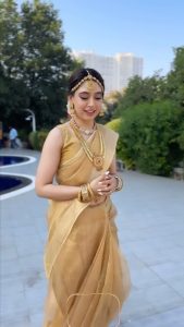 Niti Taylor Instagram - Shimmering in gold, draped in tradition. Authentic South Indian charm with a touch of wow! #murthy#reelitfeelit #instagramreels #reelsinstagram #instagram