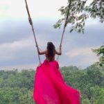 Niveditha Gowda Instagram - 👗 : @chandangowda_official Wow what a feeling … I felt like a princess with this flowy dress and the place .. it made me embrace my journey a lot more . Going on a solo trip is so out my comfort zone but I wanted to try it . The first day was hard , I did not how to eat alone , go on adventure , blend with strangers many more . I even cried on the first day but right after this swing moment I honestly started to fall in love with the memories I could make . This experience has helped me to learn about new cultures and each day is more exciting than the other . I feel so responsible than ever and am so happy for #creatingmemories #blessed #grateful #bali #baliswing #nivedithagowda #solotraveler #solotravel #sunset #travelling