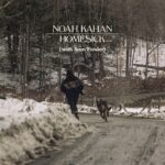 Noah Kahan Instagram – When I first heard Sam Fender’s music, I stopped what I was doing, started “dead boys” from the beginning and listened 4 more times. It was everything I loved about a song. I followed this artist like a crazy person, checking every day to see if he had dropped new music. Reading every lyric and looking for his interpretation of what they meant. I must have listened to Hypersonic Missiles 1000 times before Seventeen Going Under came out, and I had never felt so connected to a song. I come from a very different place than Sam did, that much was clear in the lyrics, but it felt like I had grown up the same. The nostalgia, pride, bitterness, confusion, and anger that Sam wrote about feeling was so similar to what I was feeling about my childhood and my hometown at the time. This song was the final push for me to start writing about my own experiences.

As we sat down in Guilford, Vermont to record this album, the very first song we listened to was Seventeen Going Under. The song Homesick was born out of the confidence instilled in me by listening to someone accurately depict their hometown and what it means to them, for better or for worse. 

When I found out I’d be able to spend the day in Newcastle with Sam, I was nervous but excited. He welcomed me with open arms, let me into his world, showed me places in this community that held so much significance not only to the town, but to Sam himself. I felt very much like an outsider, but by the end I did start to understand where these songs were coming from, and just how special of a guy Sam really is. He did an absolutely amazing job bringing his experience into my song Homesick. He went above and beyond and I truly can’t thank him enough. I hope you enjoy this glance into our worlds, and that it offers you the same connection that I felt when I first heard this dude sing