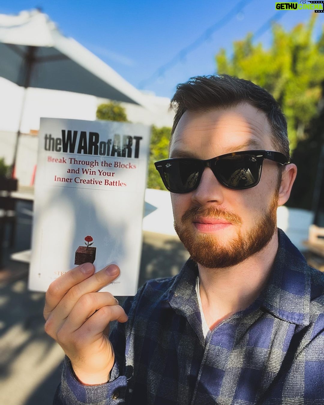Noel Fisher Instagram - You know what you should do over the holidays? #ReadAFknBook! π #TheWarOfArt is one of my all time favorite books and deeply shaped how I frame much of life. Despite the title, this book isn't exclusively for artists or aspiring artists but rather anyone working to become the very best they can be at...anything. The book is about that universal antagonist that gets in between us and who or what we want to be. What Pressfield calls "resistance" It's an incredibly fast read and something I return to for a recharge frequently. I really can't recommend this one enough. A couple great quotes... βThe most pernicious aspect of procrastination is that it can become a habit. We don't just put off our lives today; we put them off till our deathbed. Never forget: This very moment, we can change our lives. There never was a moment, and never will be, when we are without the power to alter our destiny. This second we can turn the tables on Resistance. This second, we can sit down and do our work.β "Resistance is always lying and always full of shit."