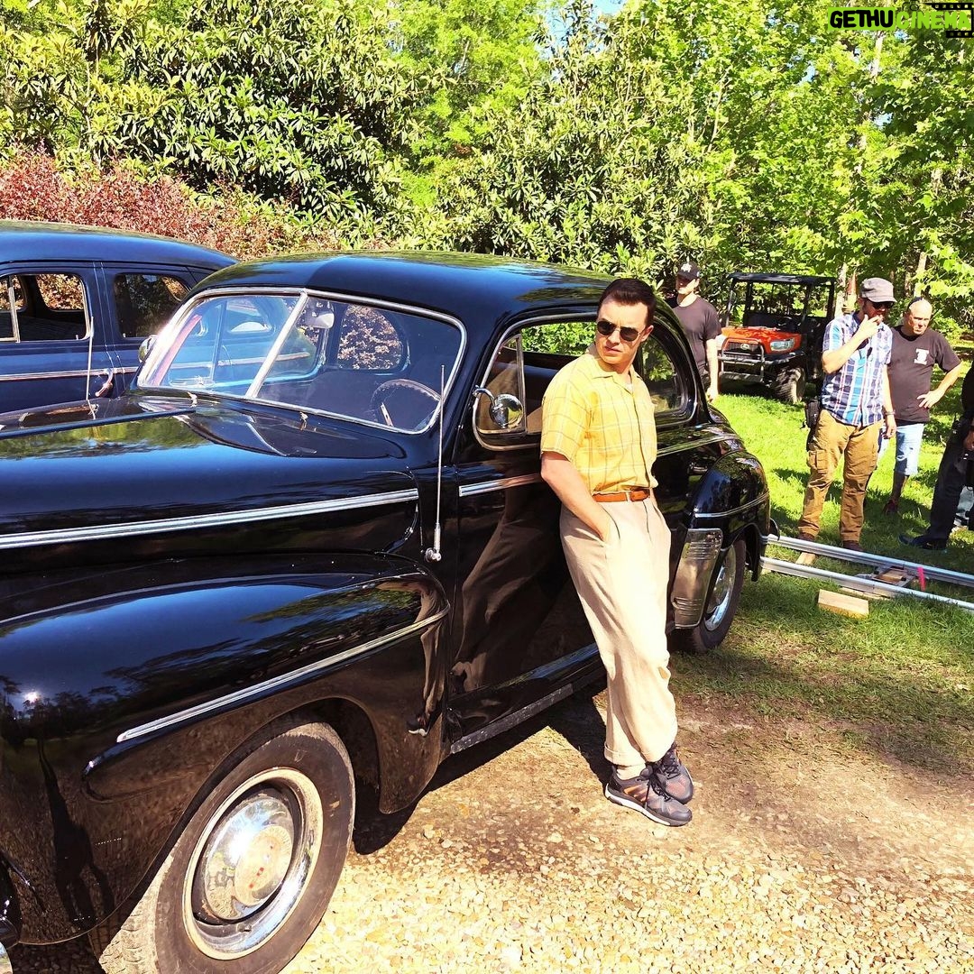 Noel Fisher Instagram - Behind the scenes with these beautiful old cars on #Capone. Also, my cross trainers really add a nice finishing touch to the 1940s vibe. 🔥🔥🔥