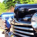 Noel Fisher Instagram - Behind the scenes with these beautiful old cars on #Capone. Also, my cross trainers really add a nice finishing touch to the 1940s vibe. 🔥🔥🔥