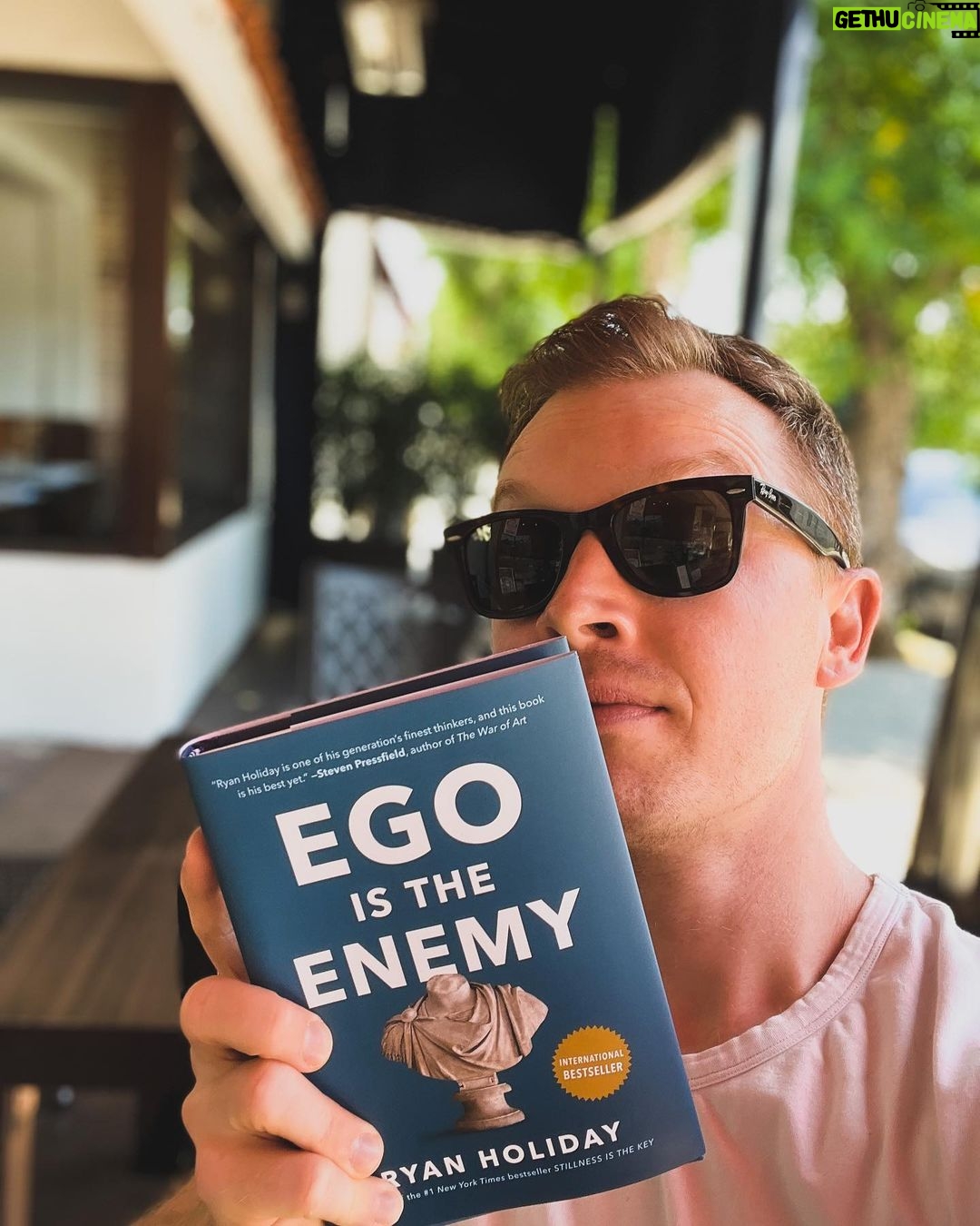 Noel Fisher Instagram - Hey you...#ReadAFknBook! First things first, I absolutely loved this book. Ryan Holiday is a great writer that combines a ridiculously deep knowledge of stoicism with relatable, modern examples and stories that make the philosophy accessible and easy to digest for basically any reader. I particularly enjoyed Holiday's framing of ego as something that separates us from...everything. Our friends, our family, our potential, our very selves and in truth, reality itself. Ego gets in between us and all of this. So learn how to deal with it. It's a quick, fantastic read that I would recommend to anyone and everyone. Below are a few of my favorite quotes, although I had a hard time narrowing it down to only these... "The pretense of knowledge is our most dangerous vice, because it prevents us from getting any better. Studious self-assessment is the antidote." "Pride blunts the very instrument we need to own in order to succeed: our mind. Our ability to learn, to adapt, to be flexible, to build relationships, all of this is dulled by pride." “Humility engenders learning because it beats back the arrogance that puts blinders on. It leaves you open for truths to reveal themselves. You don’t stand in your own way. . . . Do you know how you can tell when someone is truly humble? I believe there’s one simple test: because they consistently observe and listen, the humble improve. They don’t assume, ‘I know the way.’”