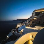 Noel Fisher Instagram - Dusk in Santorini. The houses all along this side of the island give off a beautiful glow when the sun goes down. Gives the impression that it's just starting to wake up.
