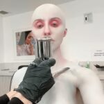 Norvina Instagram - Ai created my Halloween look. I love Midjourney and I wanted to see what look it would come up with for me. It’s felt perfectly complicated and I instantly loved it. Thanks for putting this together with me @nellyrecchia and @yvonneboyiazis for bald cap and 3D printing 😘 I went to Cinema Makeup School where she teaches and was scanned to create the exact pieces with their 3D printer. You’ll see a photo of the actual chest piece being molded by the printer. It’s so freaky and awesome. The only thing we left out are the details in the Ai beings face, didn’t really make sense for me so I left that out. Had a great time bringing to life Ai generated art